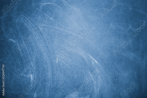 Chalk wiped out on a blue chalkboard background. Blue texture or background
