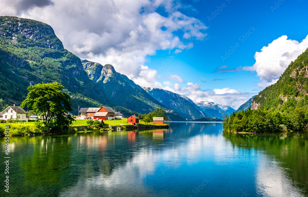 Fototapeta premium Amazing nature view with fjord and mountains. Beautiful reflection. Location: Scandinavian Mountains, Norway. Artistic picture. Beauty world. The feeling of complete freedom