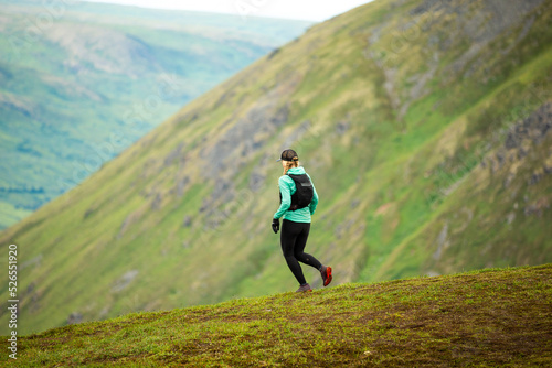woman running in the mountains