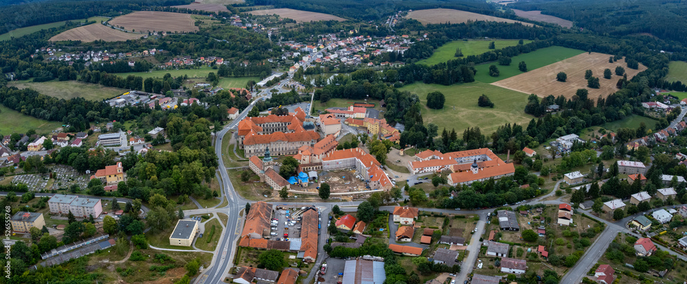 Aerial view of the city and monastery  Plasy in the czech Republic on a cloudy summer day.