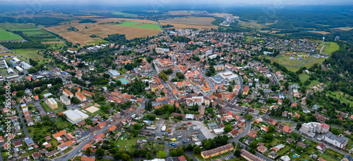 Aerial view around the city Nové Strašeci in the czech Republic on a cloudy summer day.