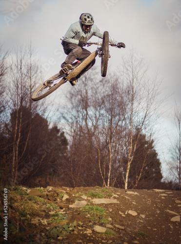 Mountain biker jumping in Wales