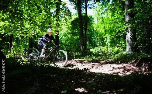 Mountain biker at speed in the forest