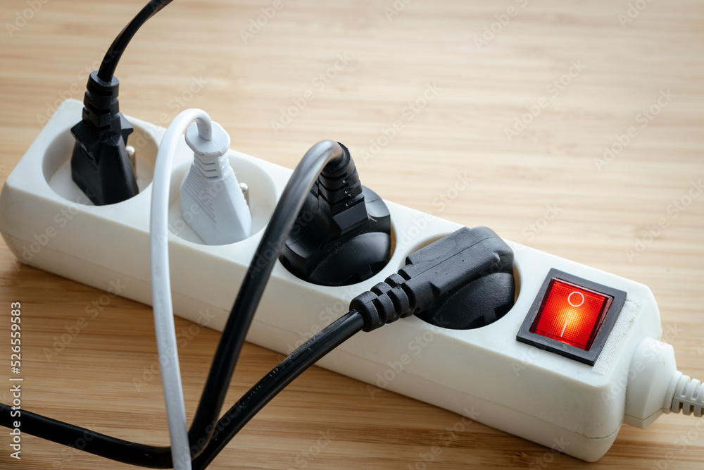 Increases in electricity prices, Energy concept, Power strip with plugs connected, Increase in energy prices for households and industry