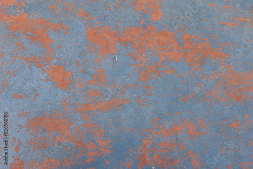 Rusty grungy aged blue and orange wall