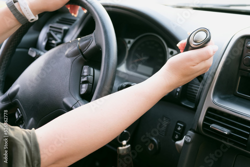 Driver hold on to the shift lever of the automatic transmission on the wheel