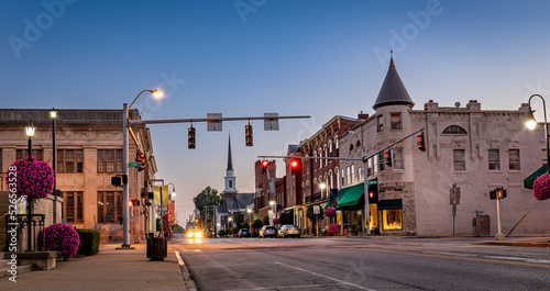 Scarce traffic on Main Street in downtown Woodford county's Versailles, KY during sunrise photo