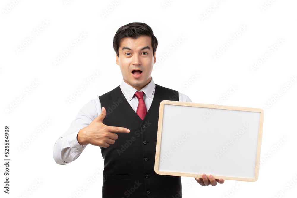 Portrait of happy smiling young businessman showing blank signboard with copyspace for text isolated on white background.