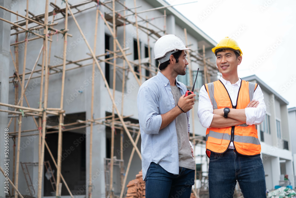 construction engineering project concept. Engineer and businessman handshake at construction site. portrait of Construction worker. construction engineering project concept. Engineer and businessman handshake at construction site. portrait of Construction worker.