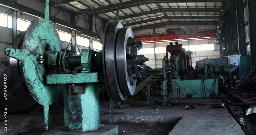 Machine unrolling cold rolled steel coils Machine unrolling cold rolled steel coils