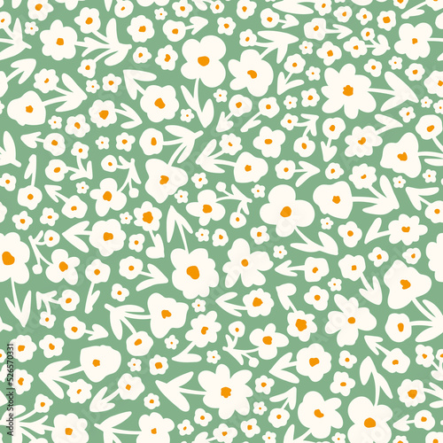 Flowers with leaves seamless repeat pattern. Random placed, vector cottage core floral all over surface print on green background.