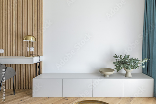 Modern minimalist interior design with wooden furniture, oak floor in Scandinavian style. Aesthetic simple interior design concept.