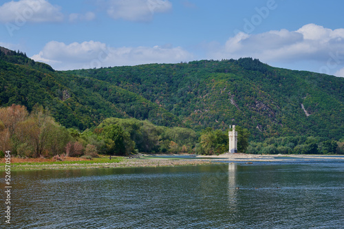 the so-called Mäuseturm of Bingen in Germany at low water in Rhine river photo