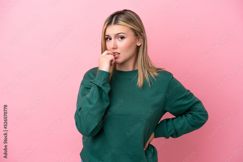 Young caucasian woman isolated on pink background nervous and scared Young caucasian woman isolated on pink background nervous and scared