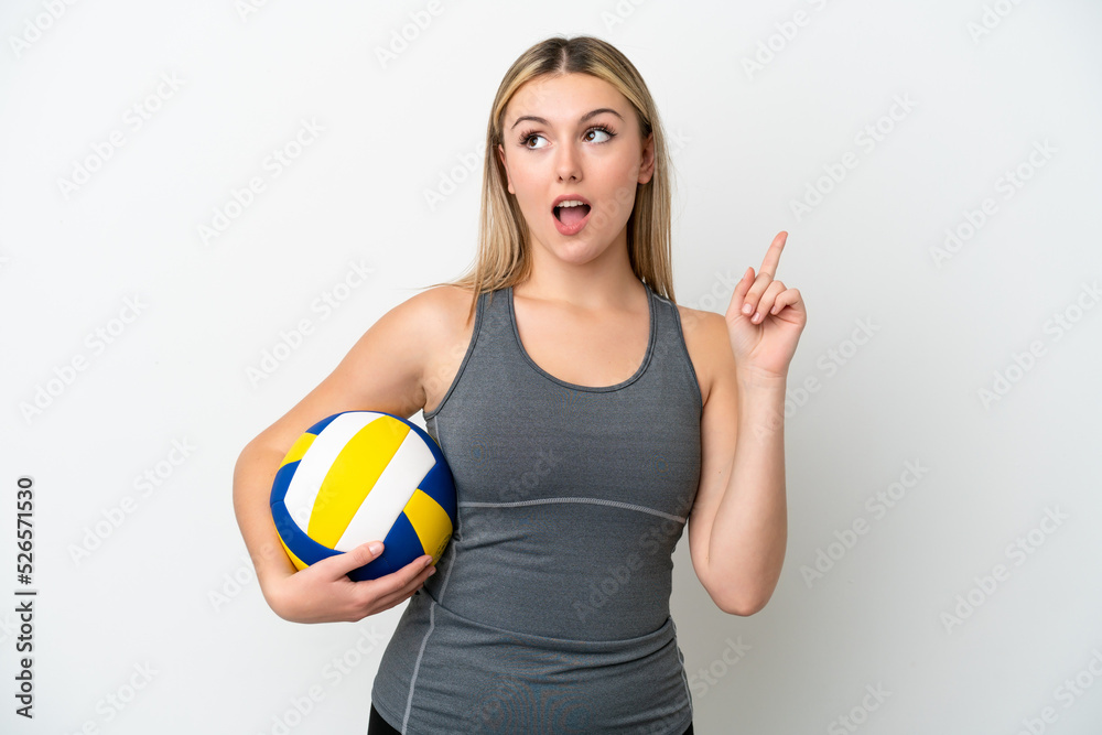 Young caucasian woman playing volleyball isolated on white background thinking an idea pointing the finger up Young caucasian woman playing volleyball isolated on white background thinking an idea pointing the finger up