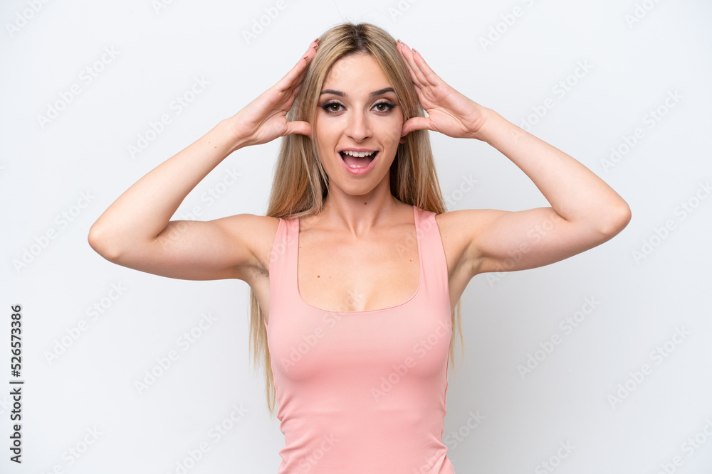 Pretty blonde woman isolated on white background with surprise expression