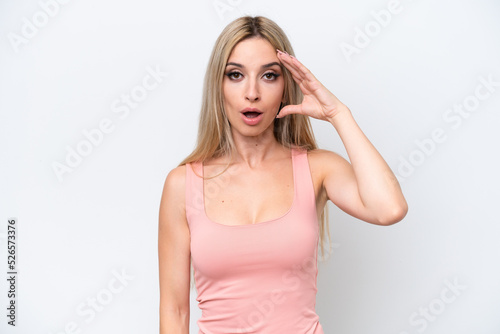 Pretty blonde woman isolated on white background has realized something and intending the solution