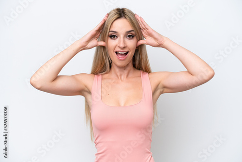 Pretty blonde woman isolated on white background with surprise expression