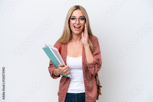 Pretty student blonde woman isolated on white background with surprise and shocked facial expression