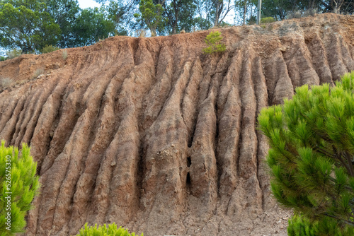 Mountain slope badly eroded by the rains.