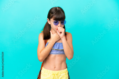 Little caucasian kid going to the beach isolated on blue background is suffering with cough and feeling bad