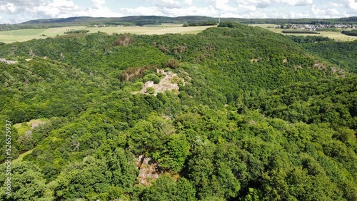 Aerial view of the Schmidtburg Hunsruck castle in the green hills photo