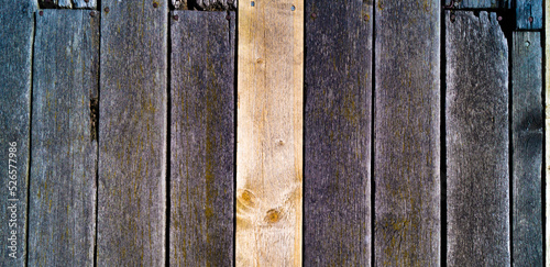 Top down view of old wooden pier planks forming wooden textured pattern