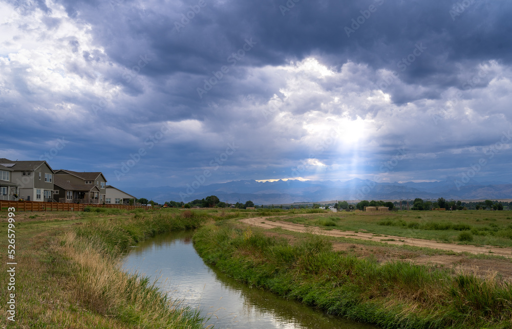 Sun rays through the clouds in Colorado, USA Sun rays through the clouds in Colorado, USA