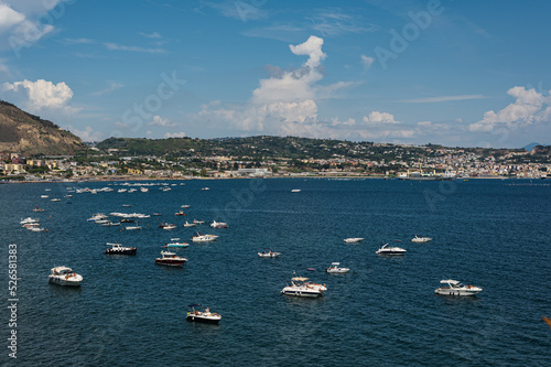 Peaceful sea vacation on a yacht (boat) in a bay on the Tyrrhenian Sea near Naples. Parking, chartering, board rental.