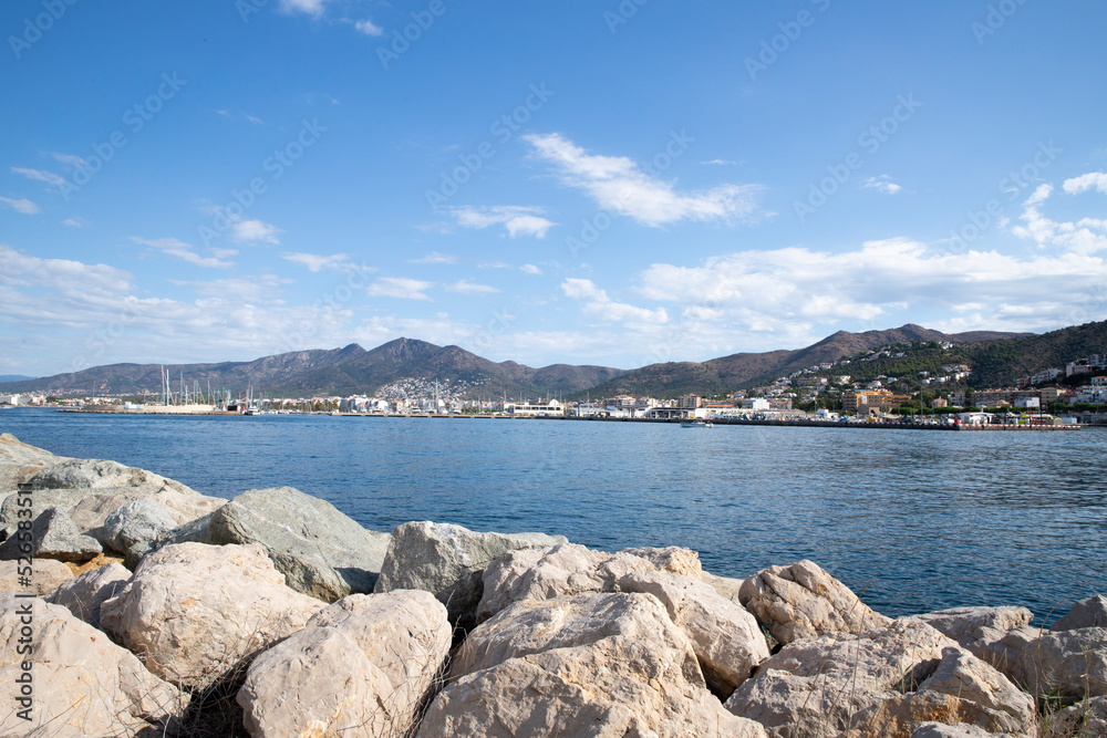 Beautiful view of the sea, sky, city and mountains. Landscape.