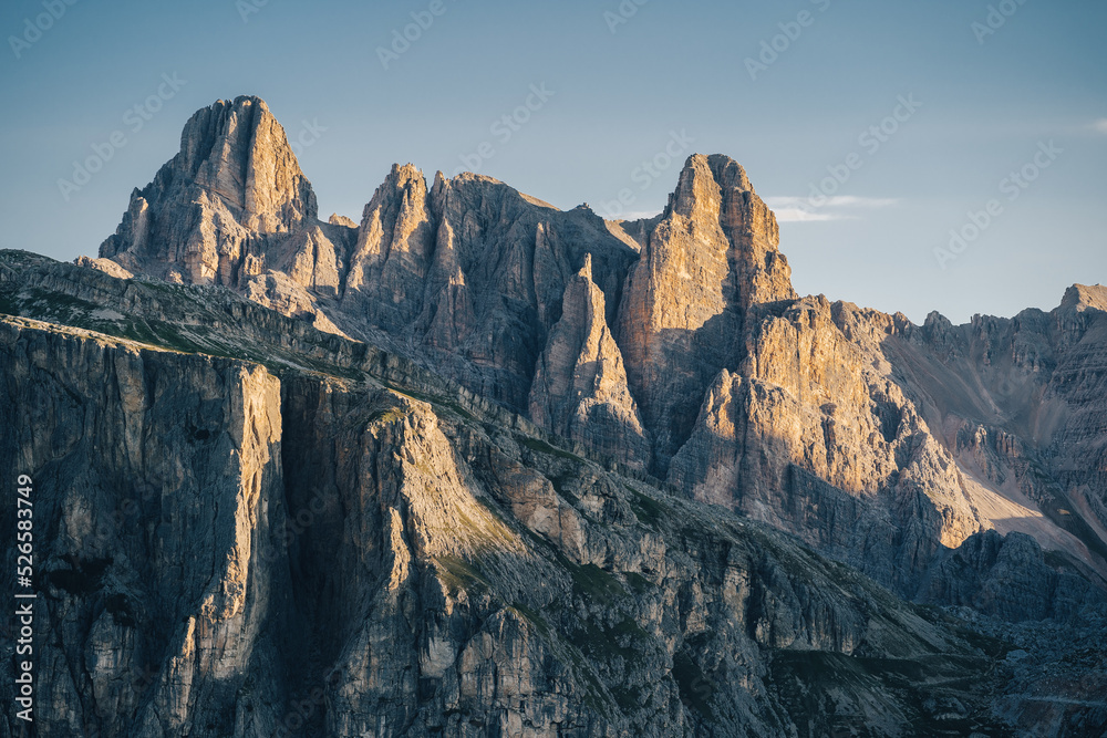 High rocky peaks of Dolomites. Rock towers in alpine mountain landscape of Dolomites, South Tyrol, Italy. Rocky mountains background photo.