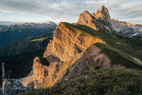 Amazing views of the Dolomites mountain landscape. Sunset view from Seceda over to the Odle mountains. Spectacular dolomitean landscape, Tyrol, Italy.