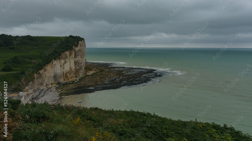 High angle view to the rock cliffs on the Alabaster Coast on a cloudy summer day, Plage des Grandes Dalles, Normandy, France