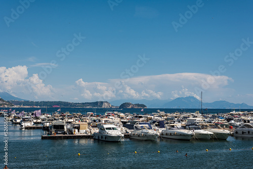 Peaceful sea vacation on a yacht (boat) in a bay on the Tyrrhenian Sea near Naples. Parking, chartering, board rental.