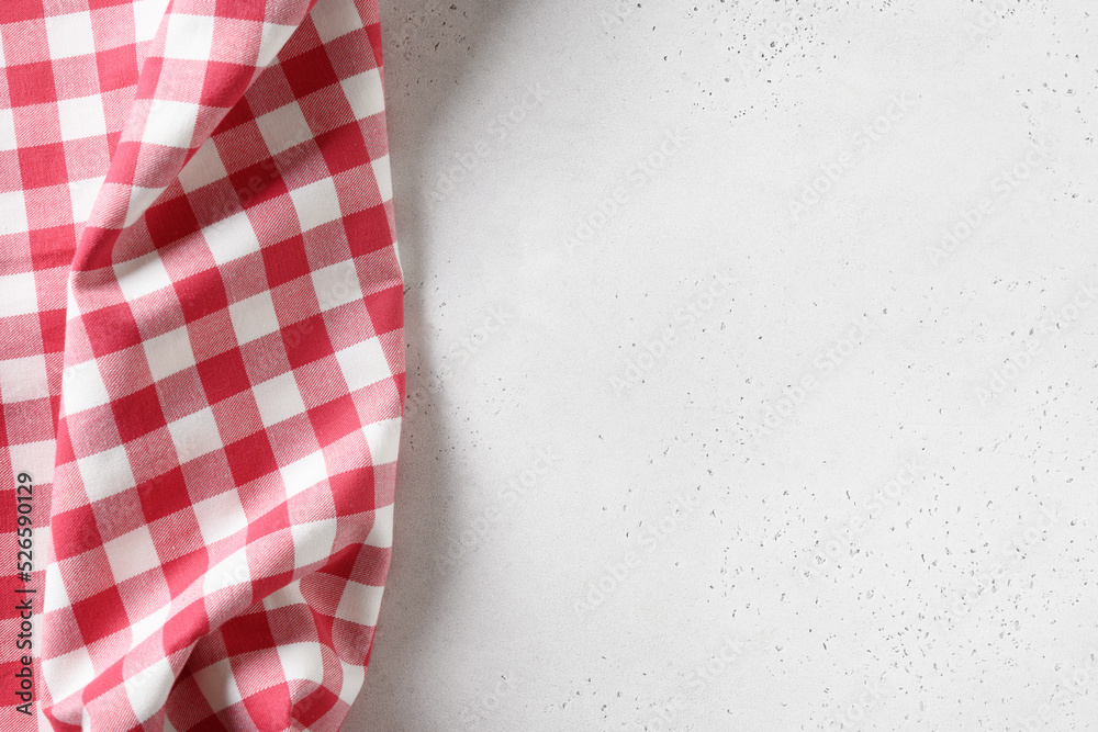 Kitchen white table with red checkered towel. Top view. Flat lay. Space for your design, recipe or menu. Kitchen white table with red checkered towel. Top view. Flat lay. Space for your design, recipe or menu.