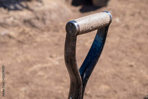 Handle of a shovel in an archaeological dig