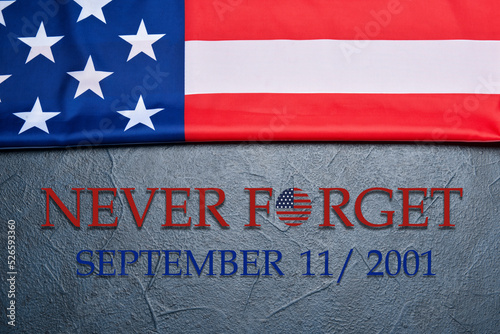 USA flag on grey background, top view. National Day of Prayer and Remembrance for the Victims of the Terrorist Attacks