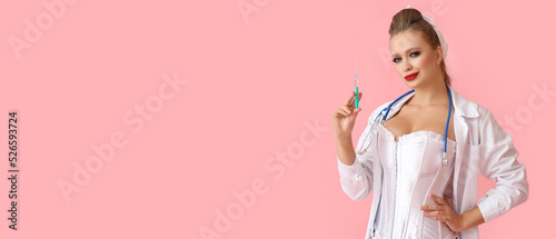 Sexy young woman dressed as...