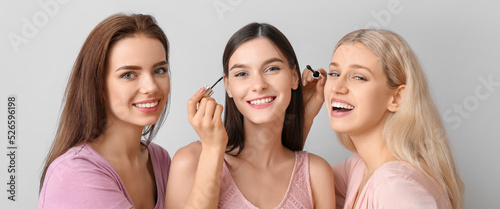 Beautiful young women apply...