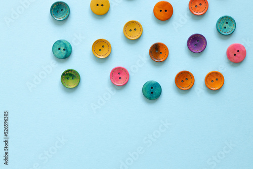 Colorful button on blue background