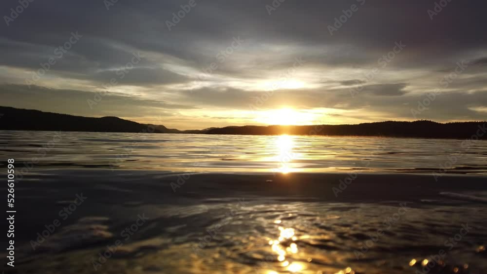 Sunrise on a small lake in northern Ontario Canada Sunrise on a small lake in northern Ontario Canada