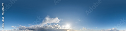 Seamless clear blue sky hdri panorama 360 degrees angle view with zenith and beautiful clouds for use in 3d graphics as sky replacement and sky dome or edit drone shot.