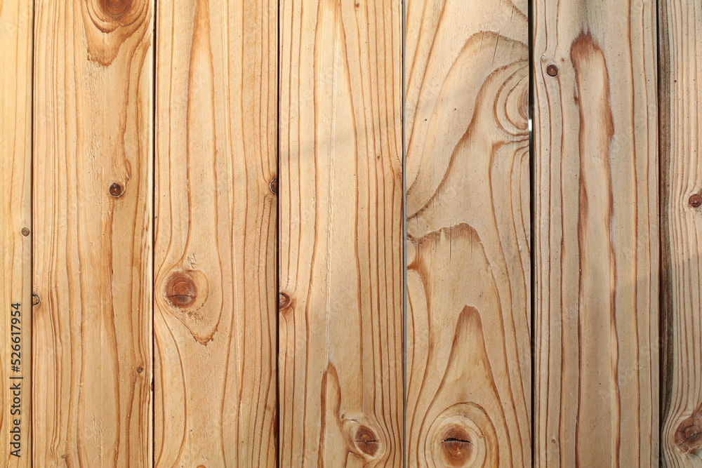 Pine wood wall with sunlight natural background and texture. Sunny morning with light and shadow. Copy space. Pine wood wall with sunlight natural background and texture. Sunny morning with light and shadow. Copy space.