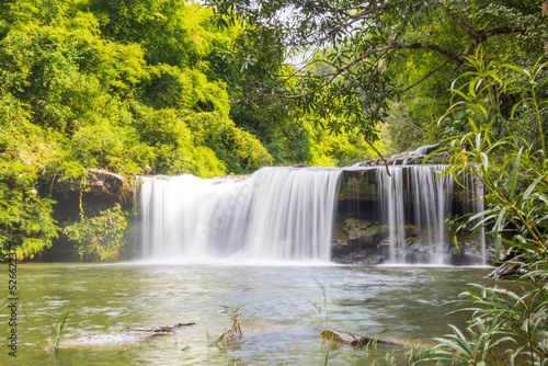 Waterfall in the deep forest. River stream waterfall in the forest landscape. Leaf moving low-speed shutter blur. Ubon Ratchathani  Thailand  Asia.
