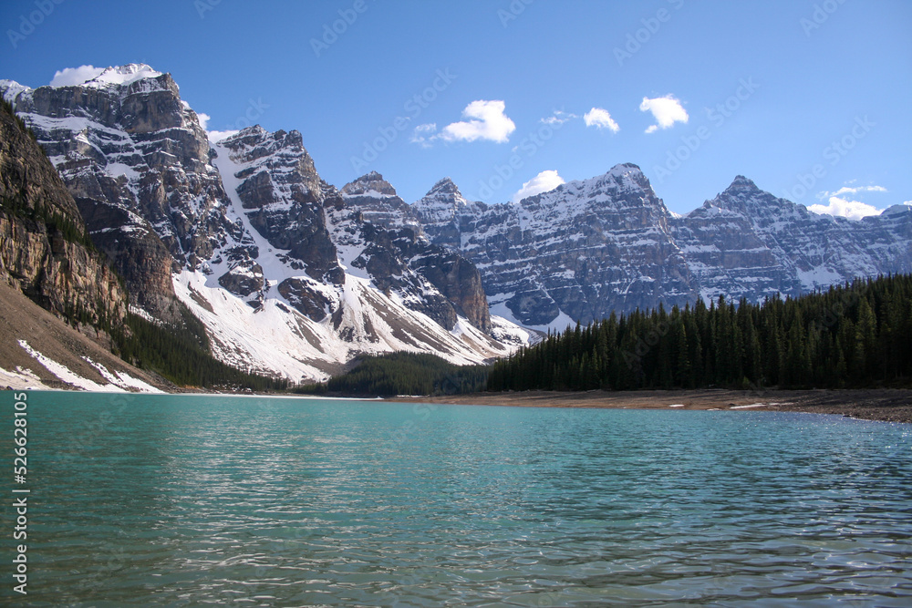 A clear day on the shore of Moraine Lake in western Alberta, Canada.