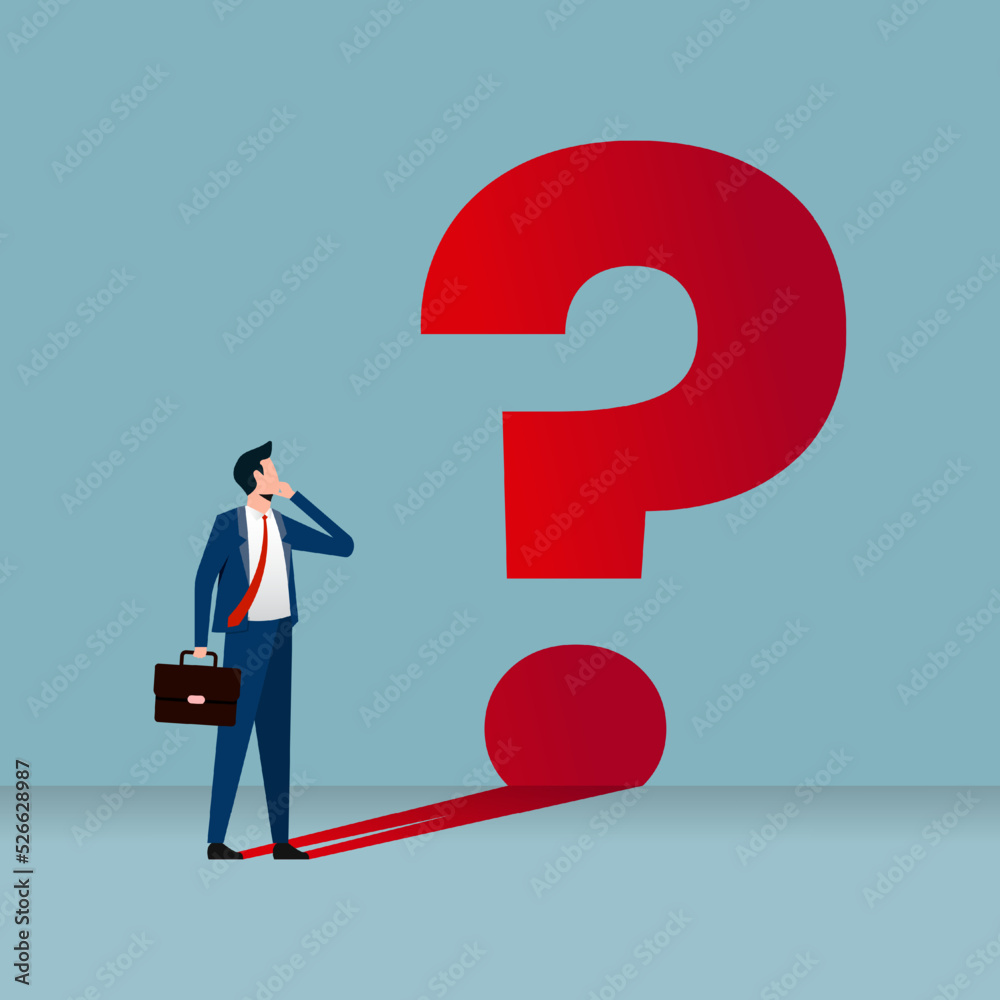 Thoughtful businessman thinking. Businessman and his big question mark shadow Thoughtful businessman thinking. Businessman and his big question mark shadow