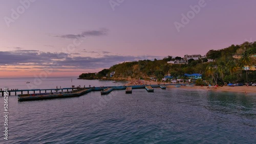 Slide to the left Drone Shot of Crash Boat Beach sunset located in Aguadilla, Puerto Rico. photo