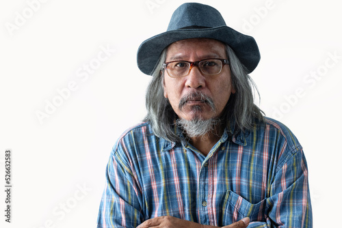 Portrait of a poor old man or homeless man wears hat has a problem with something, sad and concerned, on white background