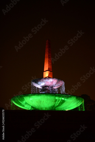 A night view of a fountain lit up in Indian flag colours outside India’s Presidential Residence or Rastrapati Bhavan in New Delhi India