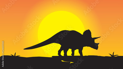 Fototapeta Naklejka Na Ścianę i Meble -  dinosaur silhouette at sunset